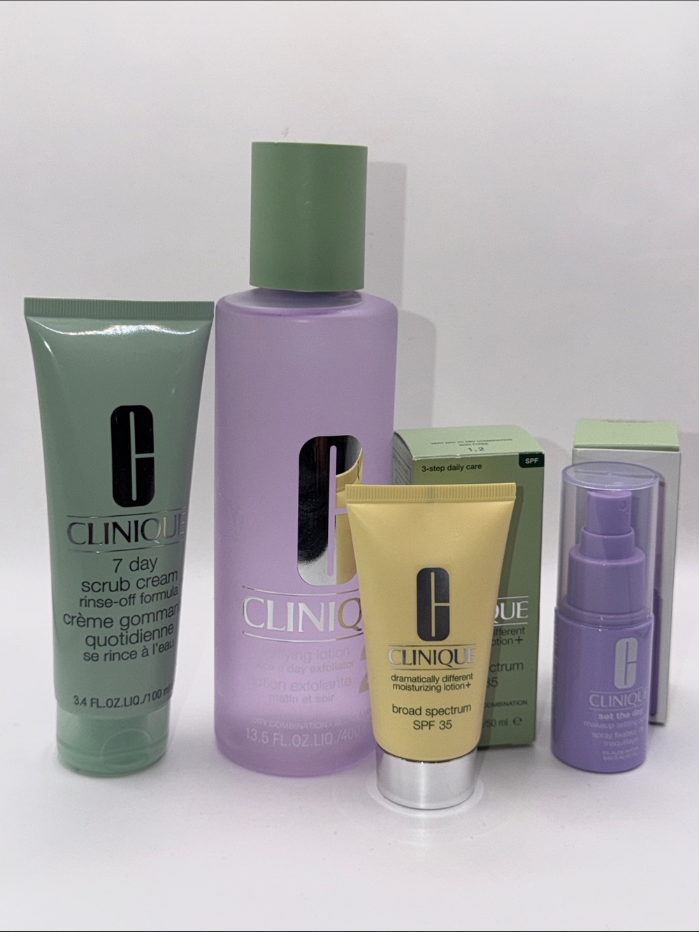 Clinique Bundle/7-DayScrubCream,Clarifying Lotion2,Moisturizer,Setting Spray NEW